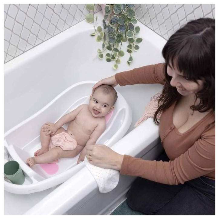 INGENUITY Baignoire bébé évolutive Deluxe rose, de la naissance jusqu'a 3 ans avec transat/hamac bébé inclus