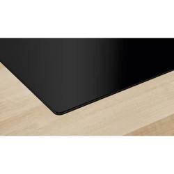 Bosch Table de cuisson aspirante induction 60cm 4 foyers 7400w noir -