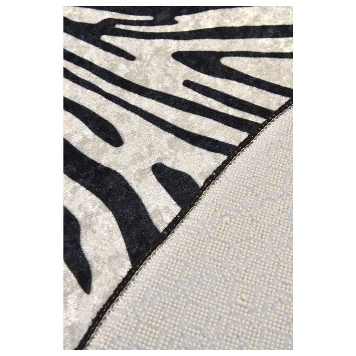 Tapis rond Ø 100 cm - polyester - Hauteur de poil : 4 mm - Poids : 700 gr/m² - Revers anti-dérapant - Lavable en machine