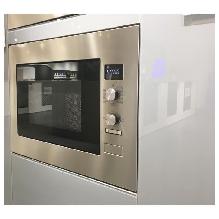 Micro ondes combiné encastrable CONTINENTAL EDISON CEMOC34IXE L59,5 x H46 x P46,8 cm Inox 34L Micro ondes combiné encastrable CONTINENTAL EDISON CEMOC34IXE L59,5 x H46 x P46,8 cm Inox 34L