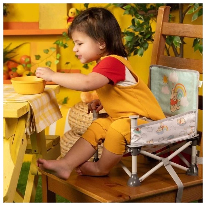 DISNEY BABY -WINNIE- Rehausseur de chaise pliable, nomade, de voyage, Léger et facile a nettoyer, Sac de transport inclus DISNEY BABY -WINNIE- Rehausseur de chaise pliable, nomade, de voyage, Léger et facile a nettoyer, Sac de transport inclus